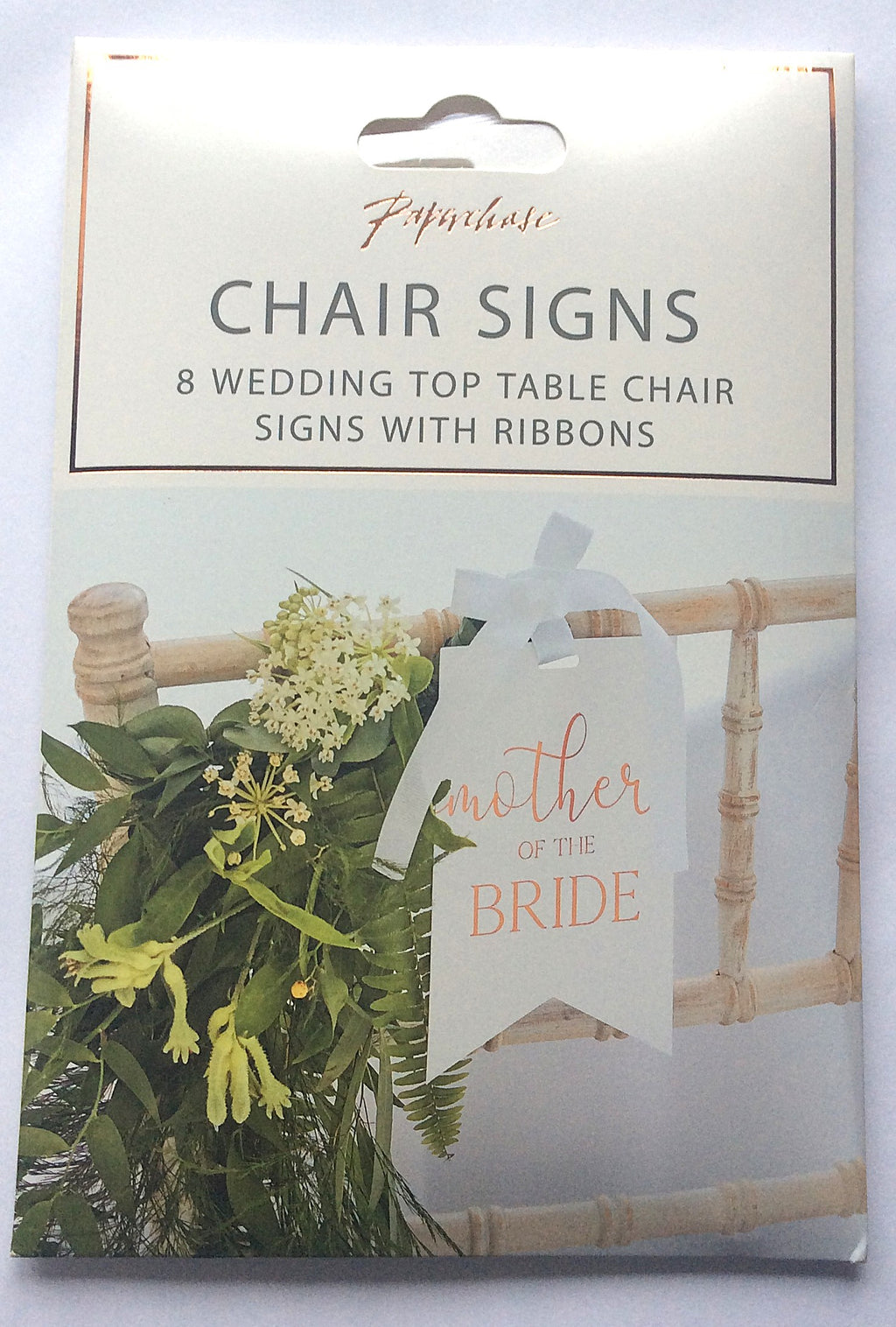 Paperchase wedding chair sign shown on a decorated wedding chair
