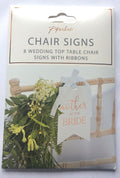 Paperchase wedding chair sign shown on a decorated wedding chair