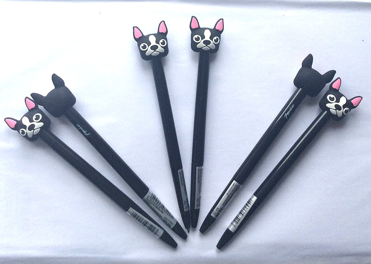 Six black Paperchase Frenchie dog novelty pens with French bulldog-style toppers