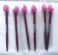 Close-up of the pink glitter quartz-style topper on a Paperchase ballpoint pen