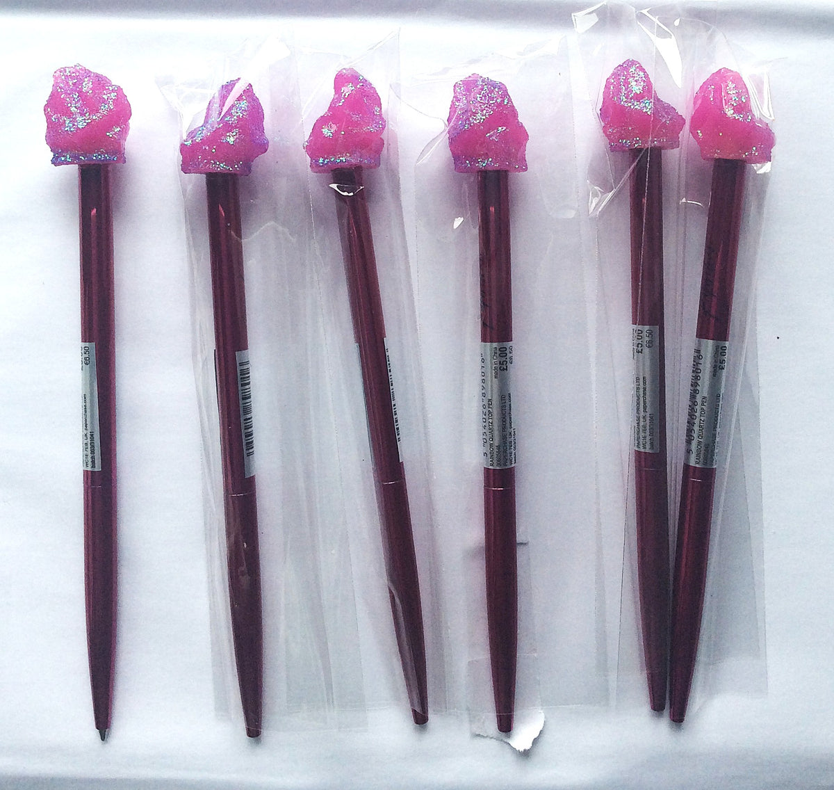 Close-up of the pink glitter quartz-style topper on a Paperchase ballpoint pen
