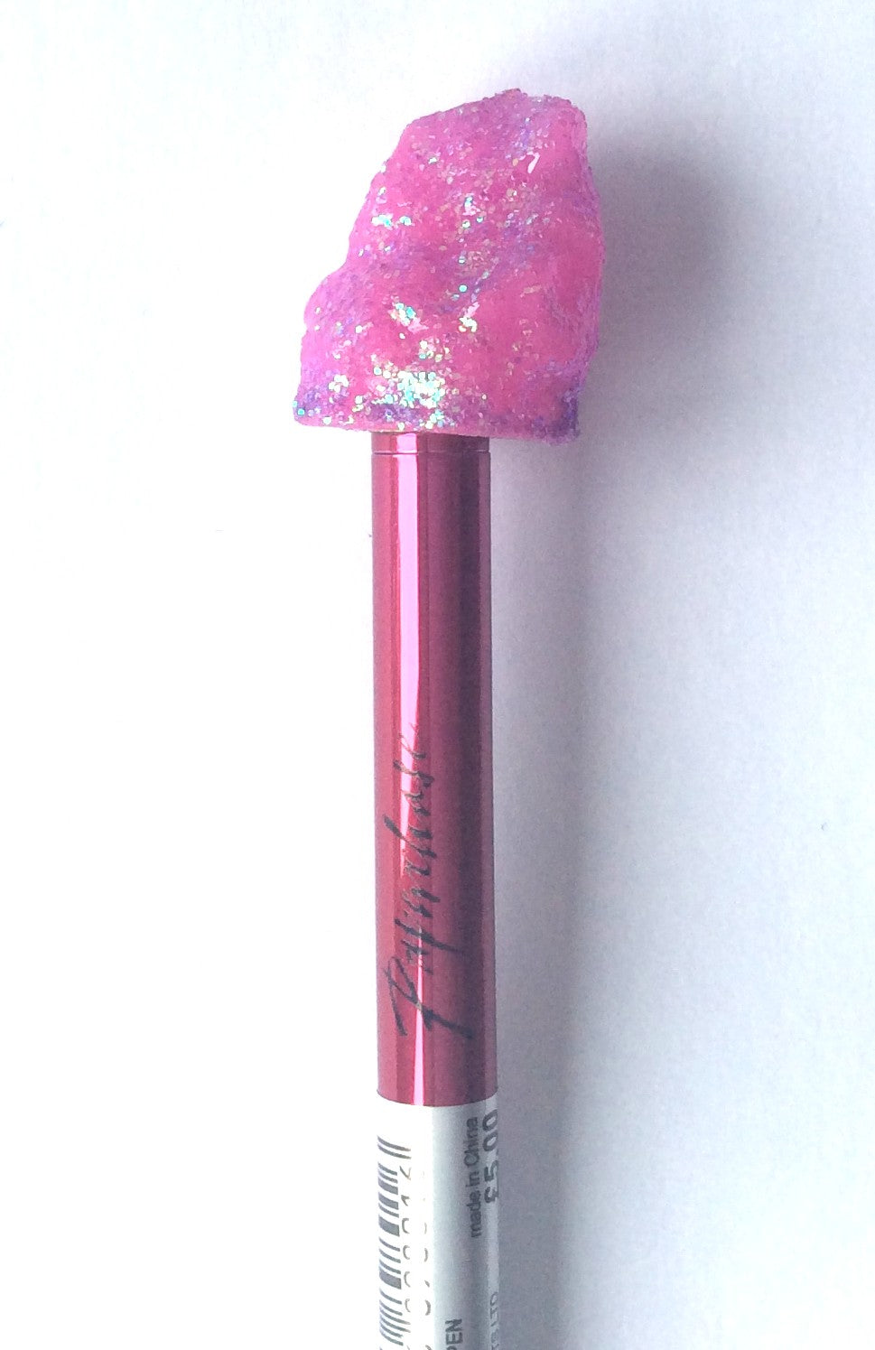 Single Paperchase metal ballpoint pen with a pink glitter quartz-style topper