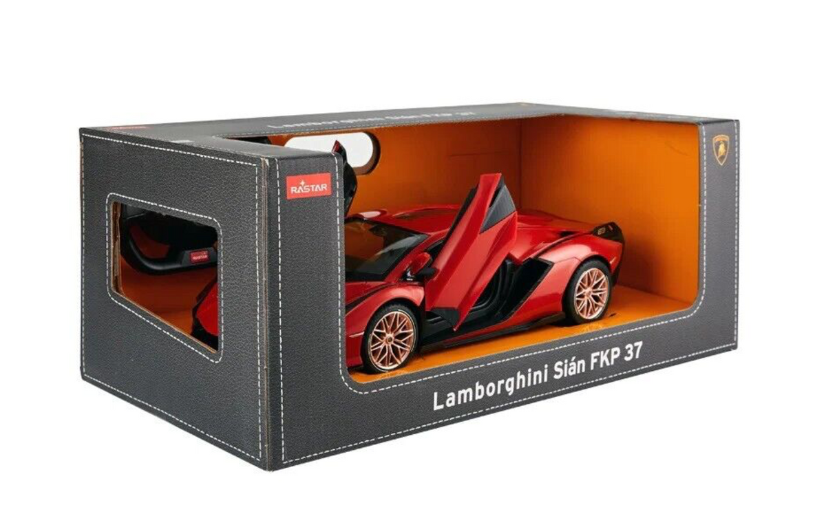 Red Lamborghini Sian remote control car with doors open alongside box and controller
