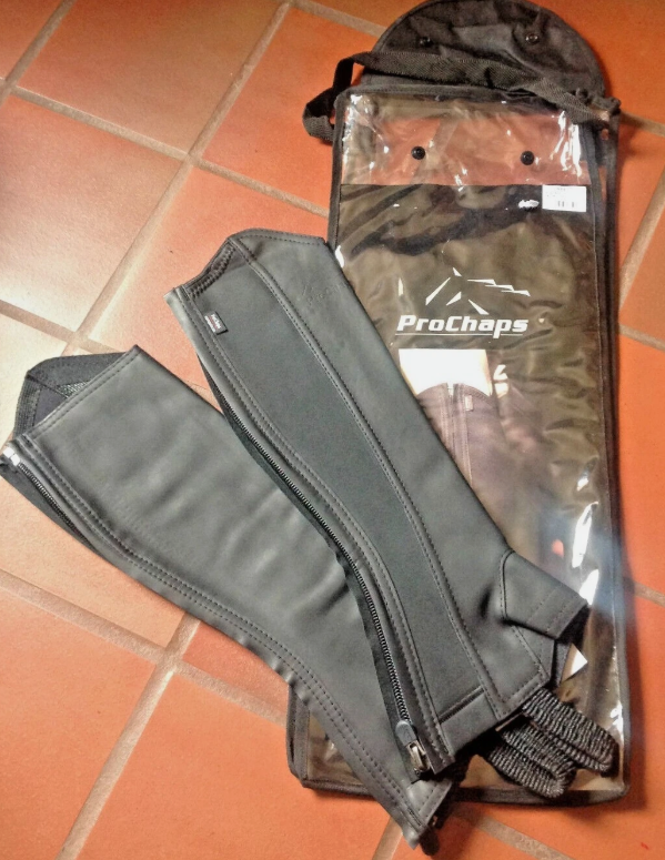 Black ProChaps Competition leather half chaps in original packaging