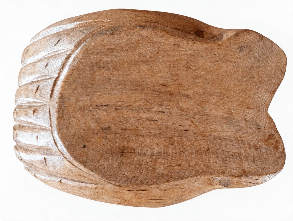 Hand-carved wooden bowl shaped as a pair of cupped human hands with a polished natural finish